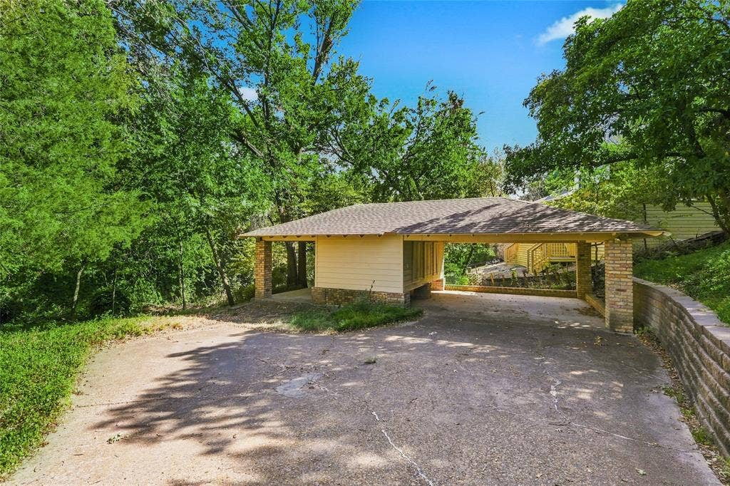 THAT COVERED PORCH Faces the CREEK!  The perfect Spot to Hear the Creek Flowing and The Brids Singing!