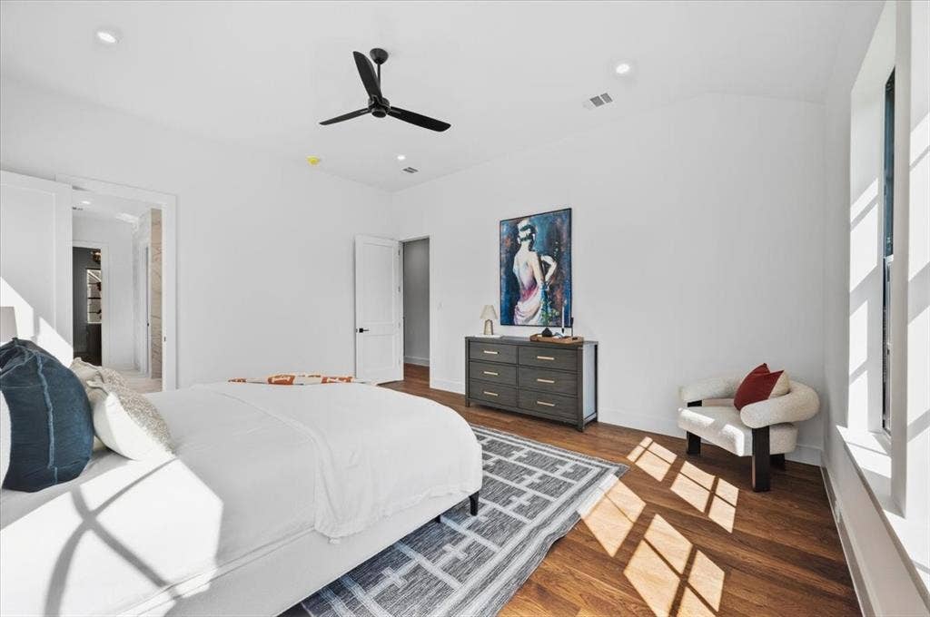 4320 Concho Street, Dallas, TX 75206 Wood-finish flooring, recessed lighting, and a contemporary ceiling fan