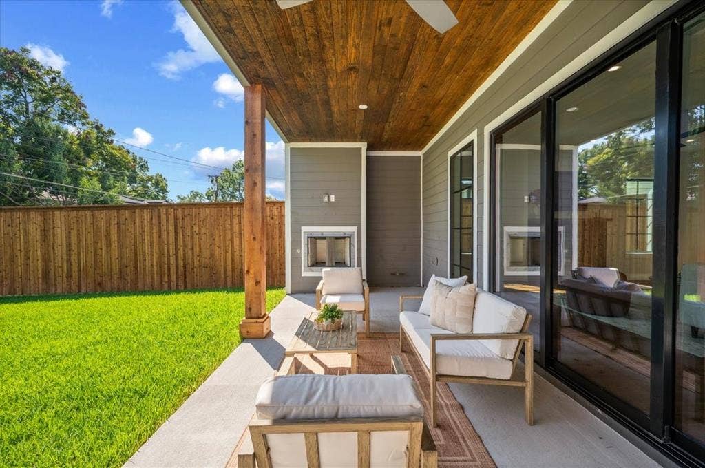 4320 Concho Street, Dallas, TX 75206 Covered patio with a wood-plank ceiling, ceiling fan, and built-in fireplace