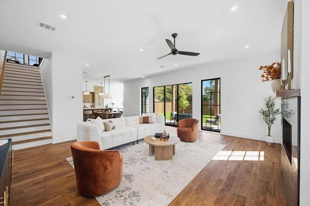 4320 Concho Street, Dallas, TX 75206 Open-concept living area with wood-finish flooring, a contemporary ceiling fan, and recessed lighting
