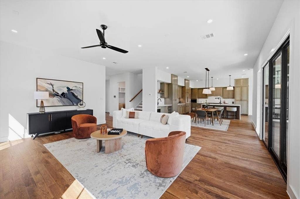 4320 Concho Street, Dallas, TX 75206 Open-concept living area with wood-finish flooring, recessed lighting, and a modern ceiling fan