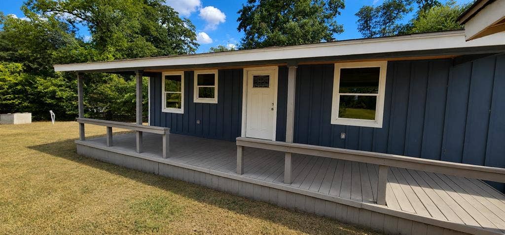 2016 Gavin Road, Tool, TX 75143 This covered porch is made for a couple of rockers and porch sitting.