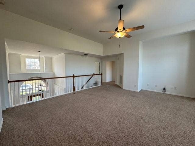 4531 Oak Shores Drive, Plano, TX 75024 Spacious loft area featuring a ceiling fan with integrated lighting, broadloom carpeting, and an open railing overlooking the lower level