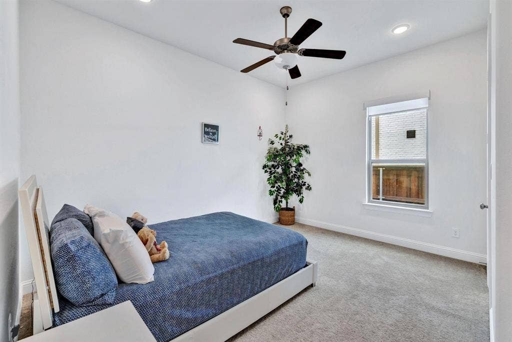 625 Quarter Horse Lane, Frisco, TX 75036 Recessed lighting, ceiling fan with light fixture, single window with roller shade, and light gray carpeted flooring