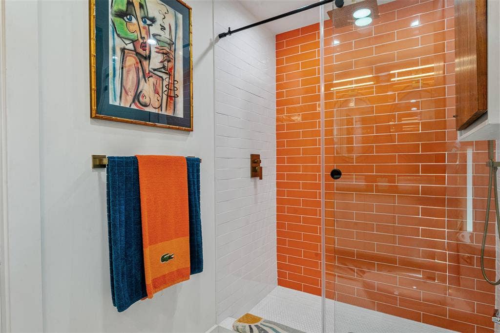 105 Azalea Court, Trinidad, TX 75163 Sliding sleek glass shower door with floor to ceiling tile.