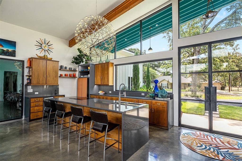 105 Azalea Court, Trinidad, TX 75163 Bespoke kitchen appliances, reclaimed walnut cabinets, quartz waterfall island, and wet bar