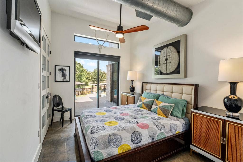 105 Azalea Court, Trinidad, TX 75163 Bedroom 2 with lake and pool views. Sliding glass doors for ease-ability to the water
