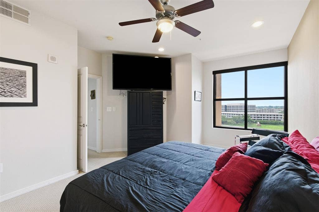 330 Las Colinas Boulevard E, #1216, Irving, TX 75039 Carpeted flooring, ceiling fan with integrated lighting, recessed lighting, and a large window with black framing