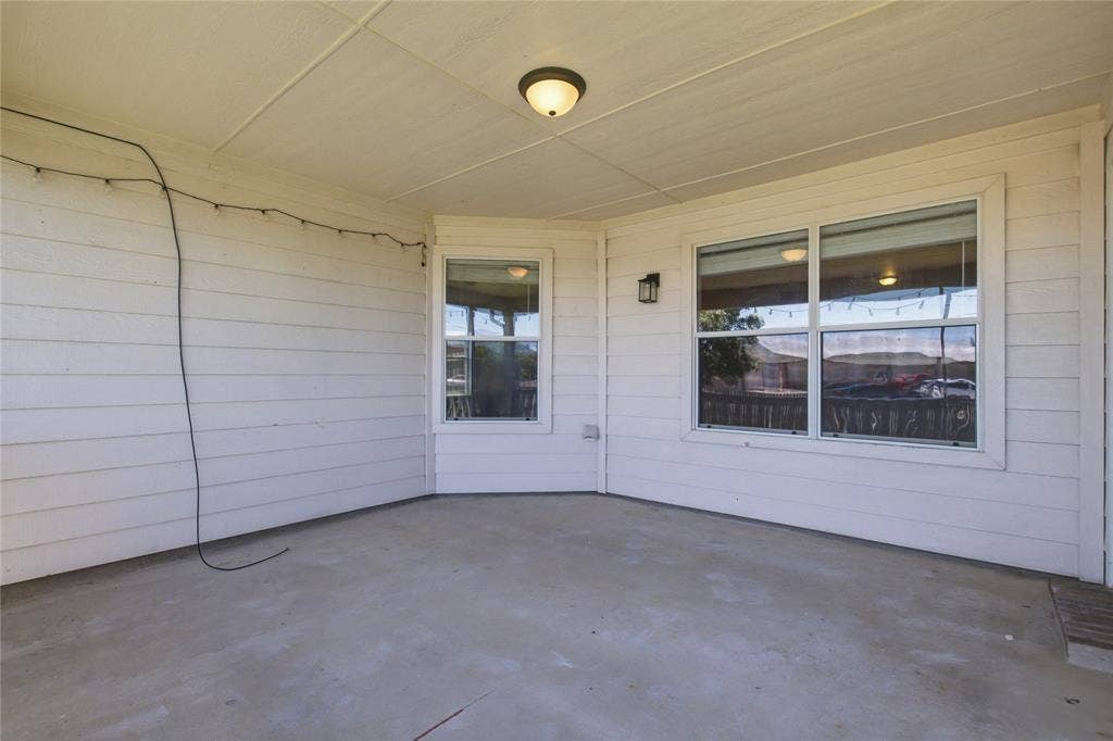 217 Ame Lane, Royse City, TX 75189 Covered patio with a concrete surface, white paneled siding, and recessed lighting