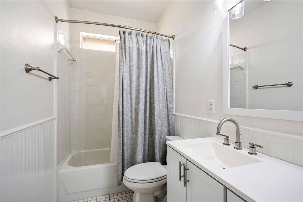 11414 Promenade Road, Frisco, TX 75035 White subway tile shower surround with integrated tub