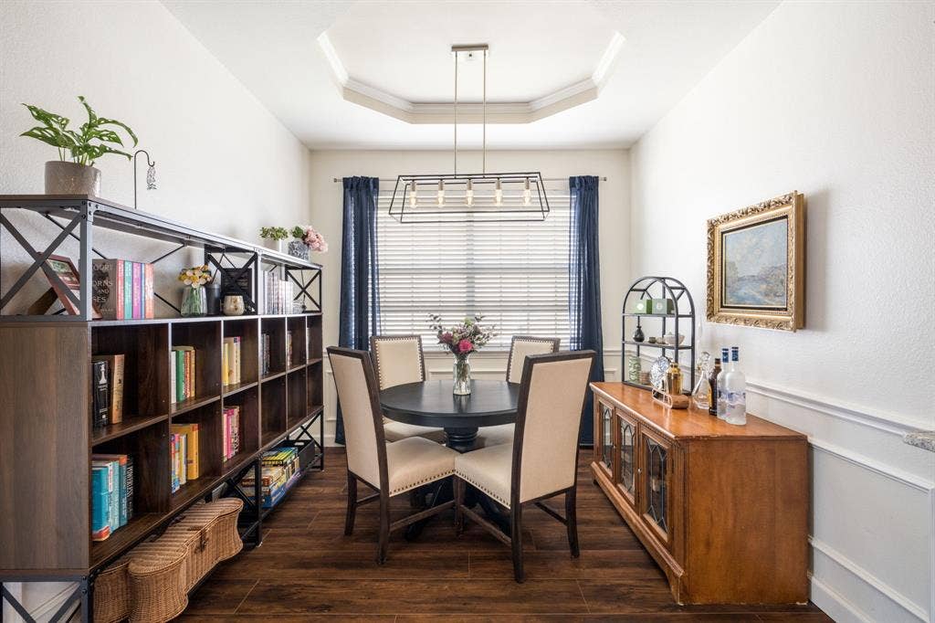 11414 Promenade Road, Frisco, TX 75035 Tray ceiling with a suspended linear chandelier