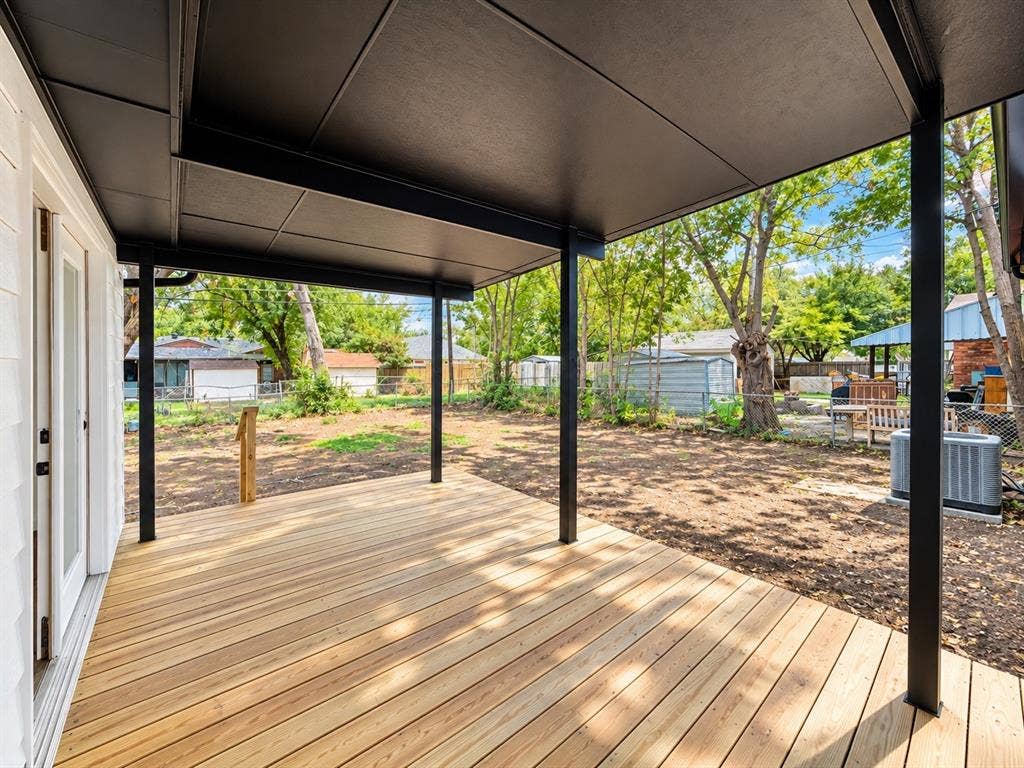 1737 Alta Vista Street, Mesquite, TX 75149 Covered outdoor deck with natural wood-finish decking and black structural support columns