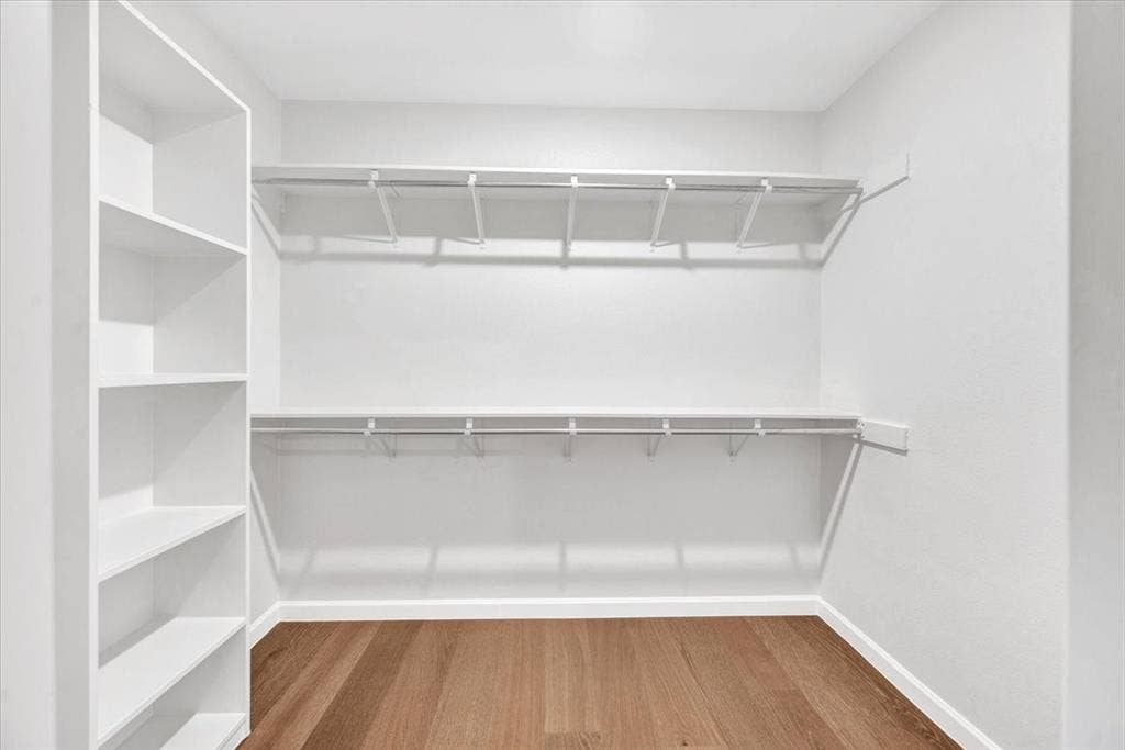 2801 W Aspen Court, Plano, TX 75075 One of two large walk-in closets in Primary