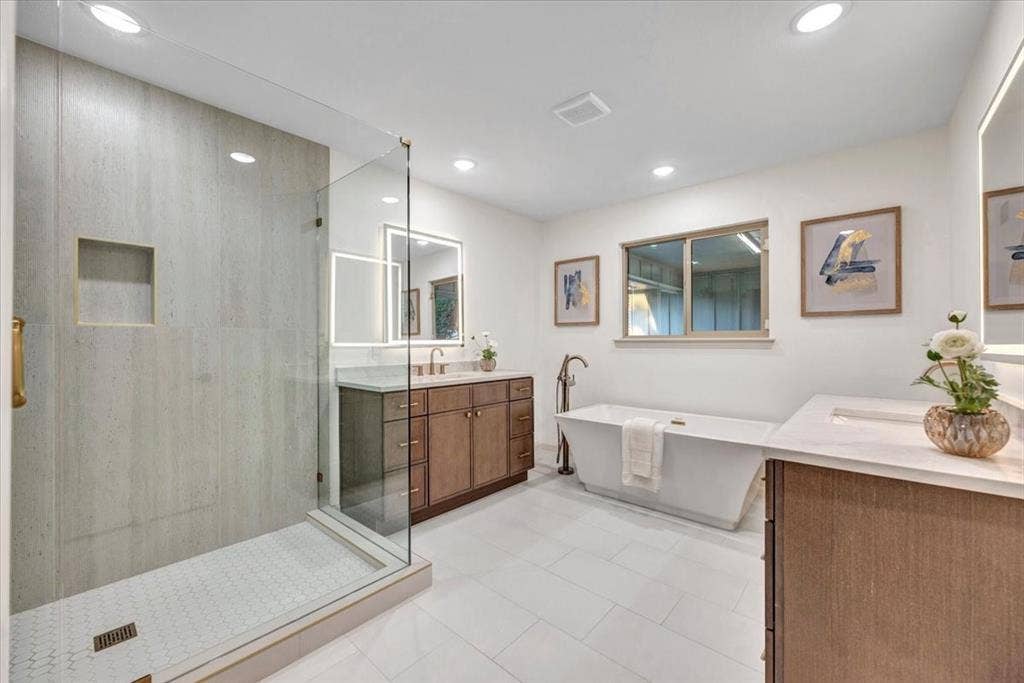 2801 W Aspen Court, Plano, TX 75075 Completely reimagined primary bathroom with double vanities, stand alone tub and large shower