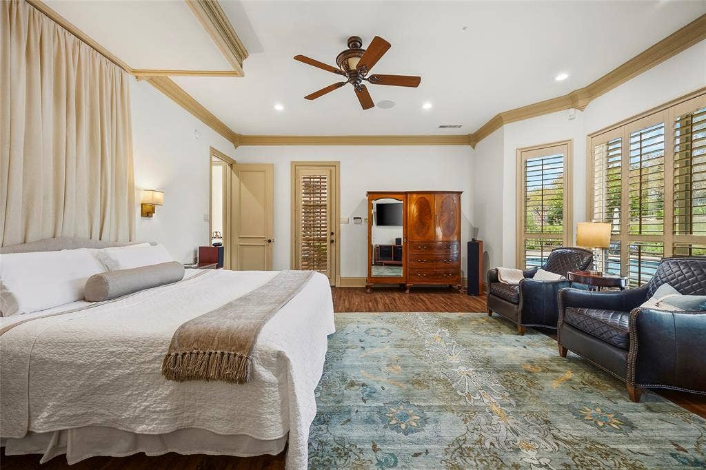 508 Moraine Way, Heath, TX 75032 Comfortable bedroom with generous proportions and timeless finishes.
