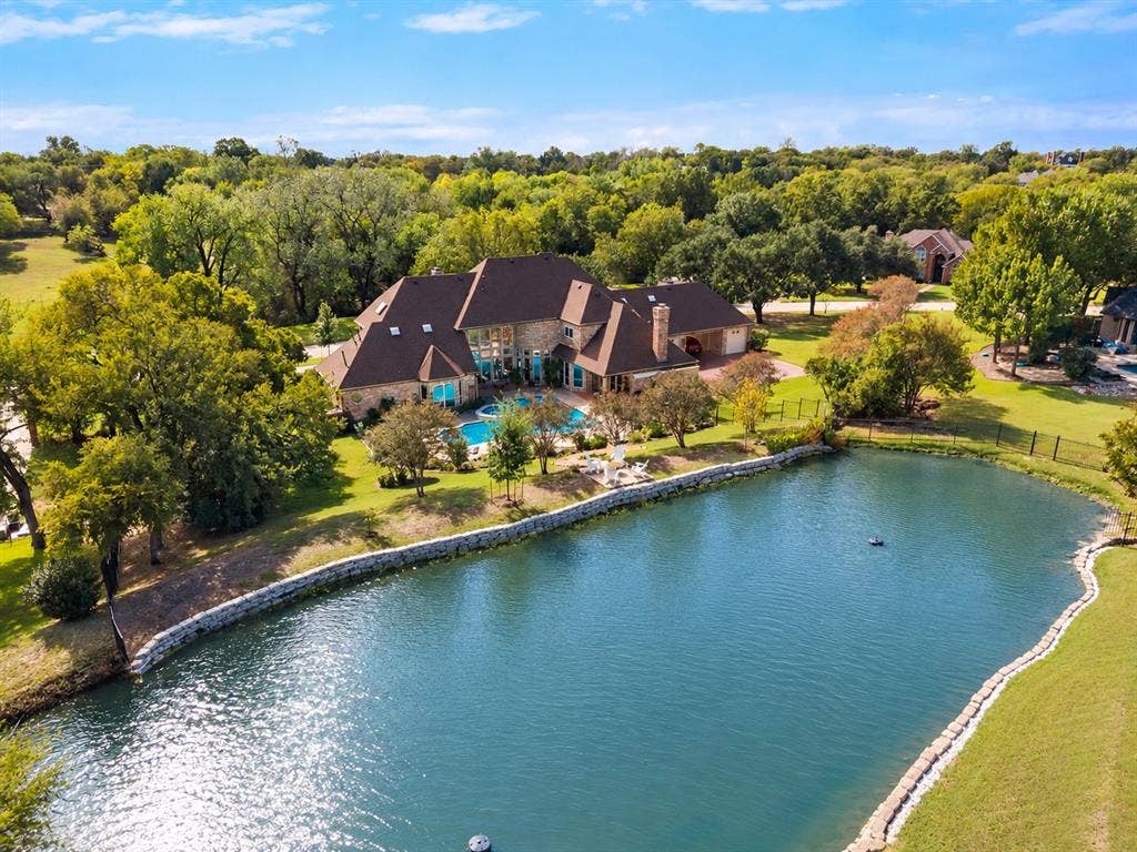 508 Moraine Way, Heath, TX 75032 Serene view of pond.