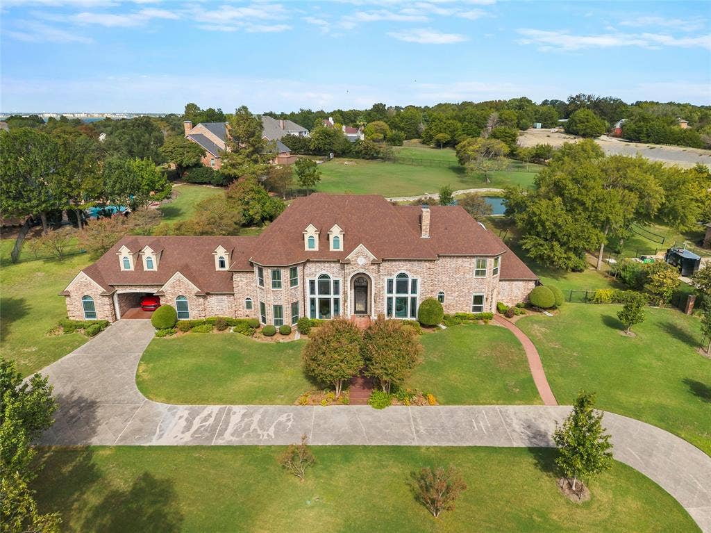 508 Moraine Way, Heath, TX 75032 Custom estate offering privacy, timeless architecture, and exceptional outdoor living.