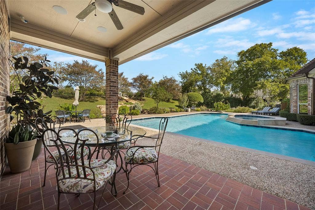508 Moraine Way, Heath, TX 75032 Peaceful outdoor terrace with beautiful views of the property’s natural surroundings.