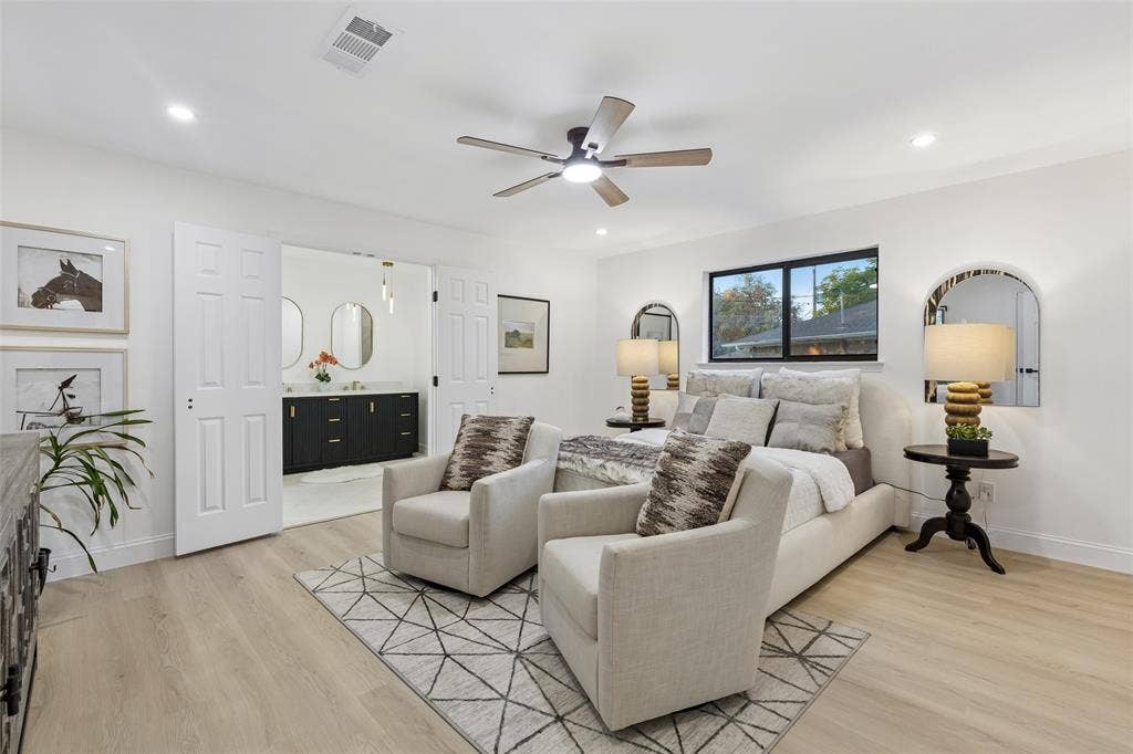 2133 Oak Valley Lane, Dallas, TX 75232 Spacious room featuring wood-finish flooring, recessed lighting, a ceiling fan, and a large window