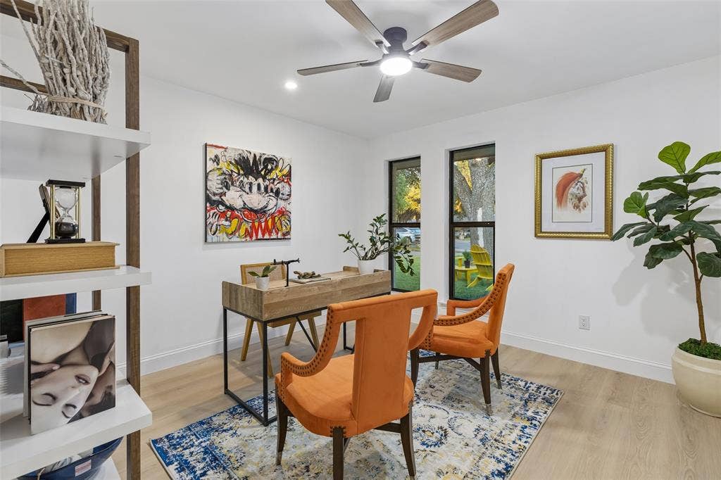 2133 Oak Valley Lane, Dallas, TX 75232 Light wood-finish flooring, built-in shelving, recessed lighting, and a ceiling fan with integrated light fixture