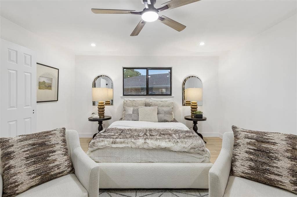 2133 Oak Valley Lane, Dallas, TX 75232 Recessed lighting, wood-finish flooring, ceiling fan, and a window with dark trim