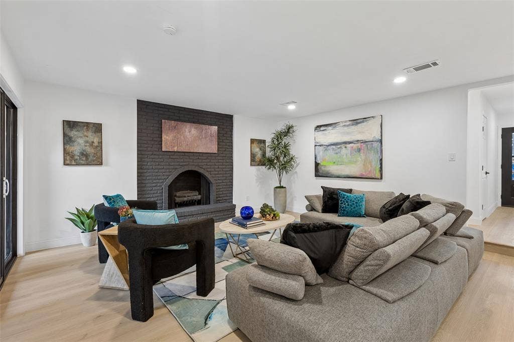 2133 Oak Valley Lane, Dallas, TX 75232 White walls, recessed lighting, and wood-finish flooring