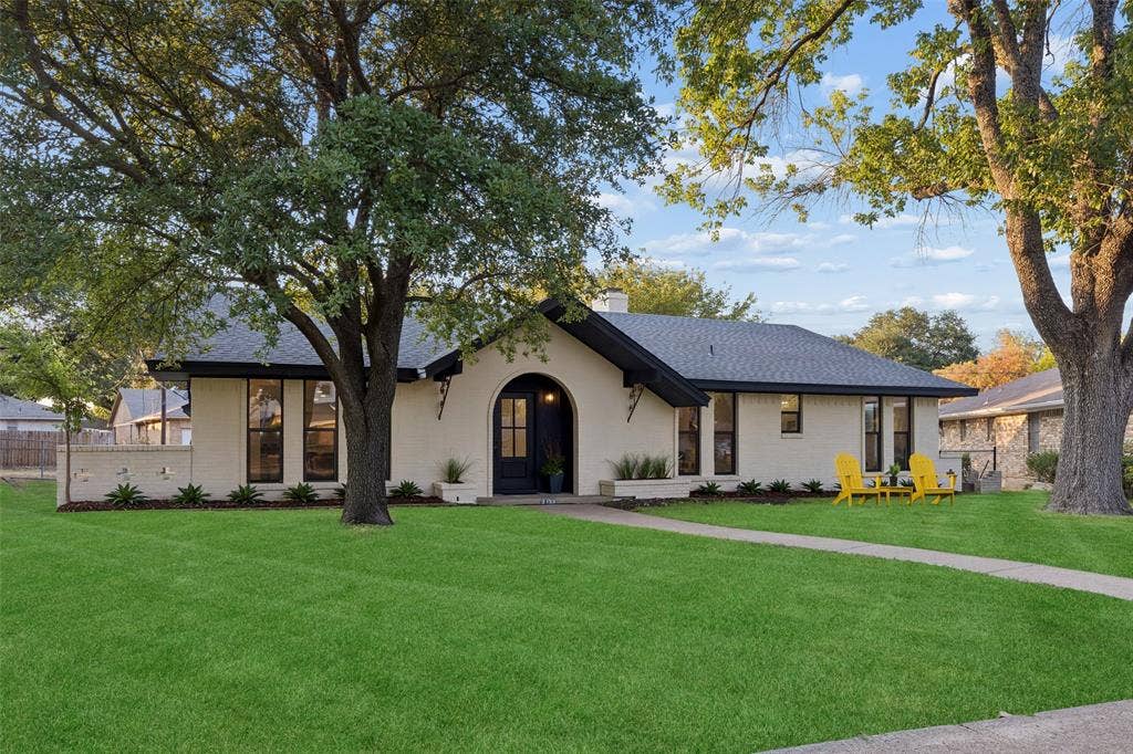 2133 Oak Valley Lane, Dallas, TX 75232 Smooth exterior with dark trim accents