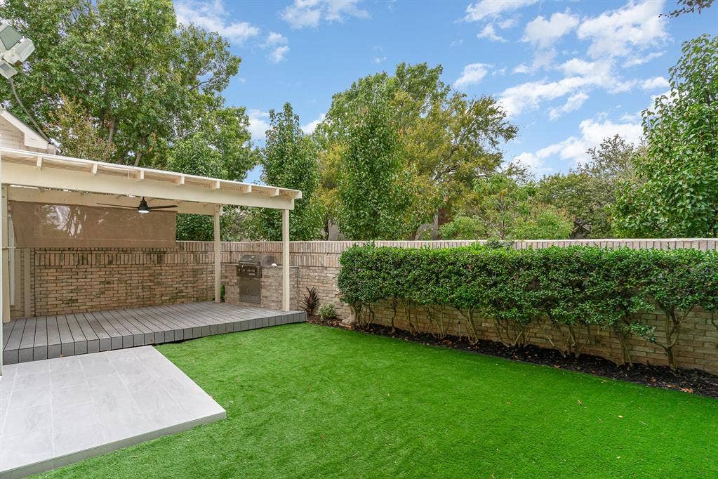 17732 Windflower Way, Dallas, TX 75252 View of yard featuring ceiling fan