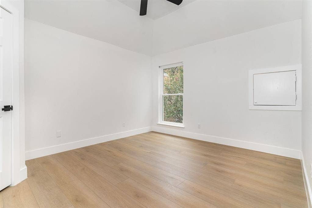 17732 Windflower Way, Dallas, TX 75252 Spare room with light wood-type flooring and ceiling fan