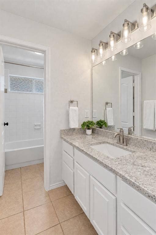 2809 Hollow Ridge Drive, Denton, TX 76210 Updated countertops and fixtures enhance the appeal of this bathroom with a private shower and toilet area.