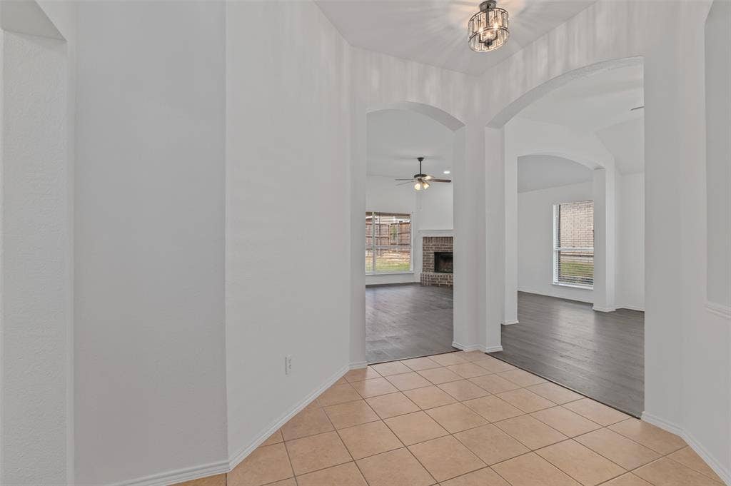 2809 Hollow Ridge Drive, Denton, TX 76210 Entryway with view of living room and dining area