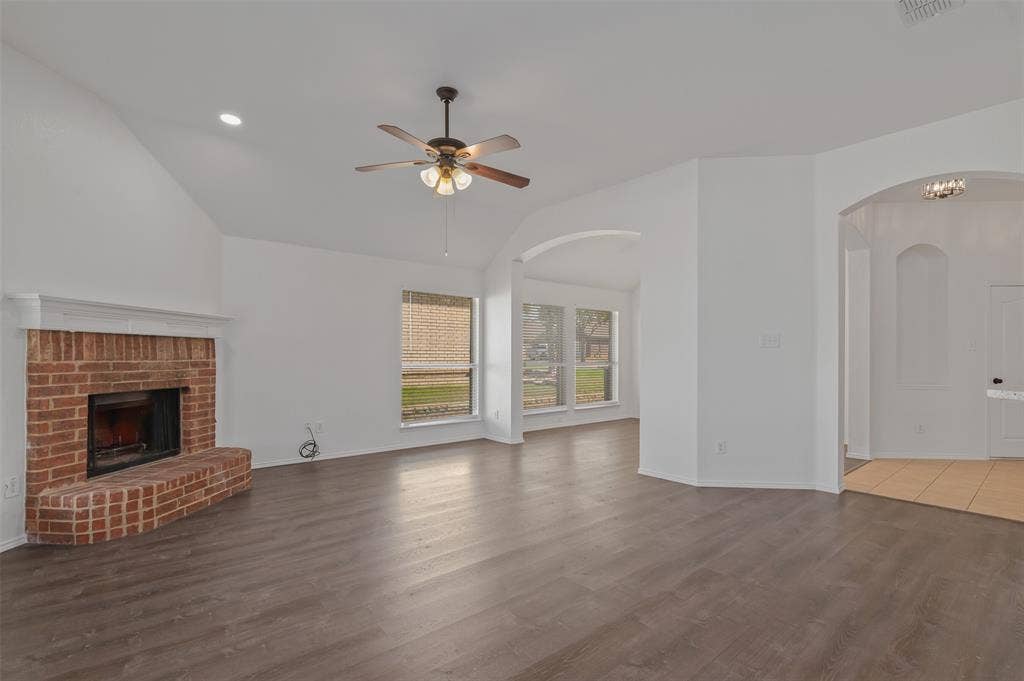 2809 Hollow Ridge Drive, Denton, TX 76210 The living room looking into the formal dining room and to the entry.
