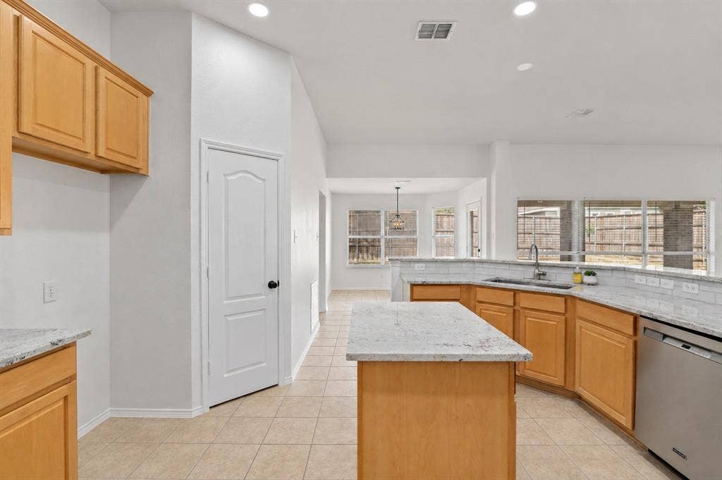 2809 Hollow Ridge Drive, Denton, TX 76210 Kitchen features include a prep island and pantry