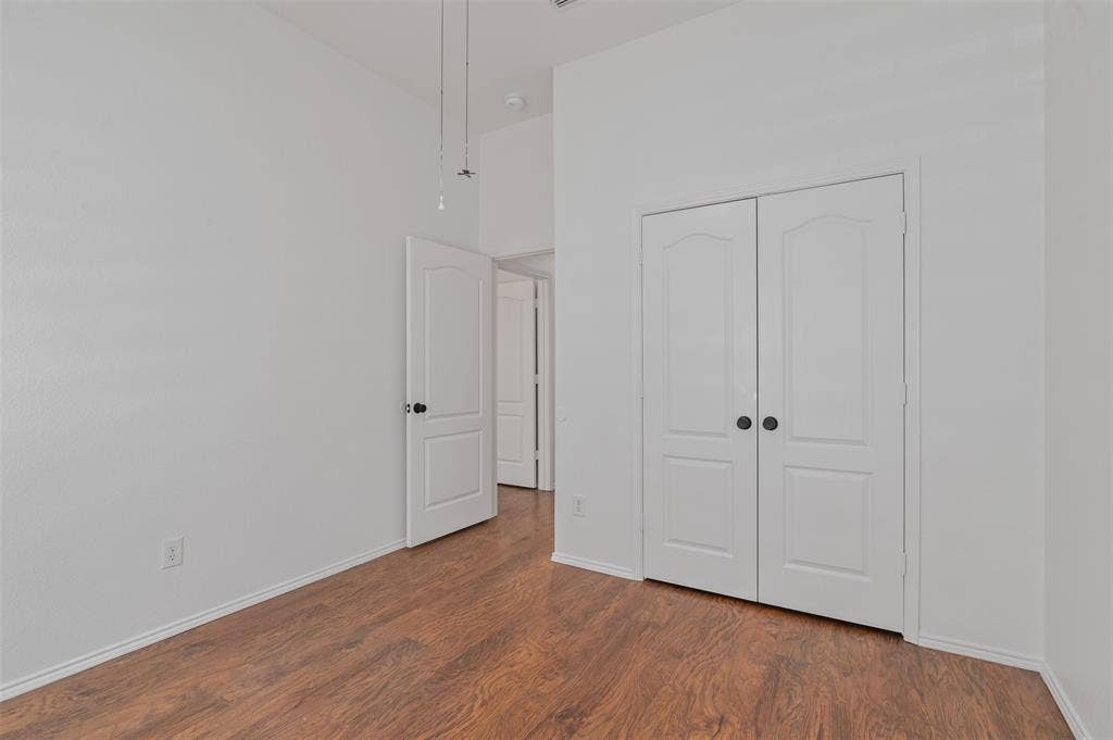 2809 Hollow Ridge Drive, Denton, TX 76210 Secondary bedroom 3 with high ceilings and boundless natural light.