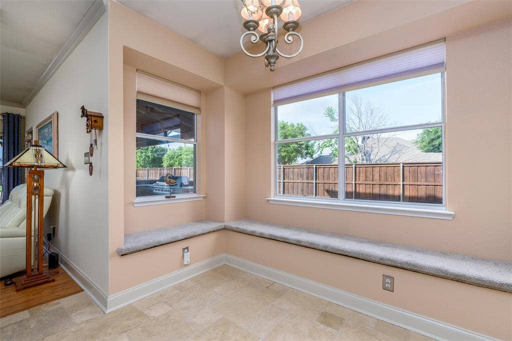 5800 Pine Ridge Boulevard, McKinney, TX 75070 Your eat in kitchen space with window benches overlooking the side yard