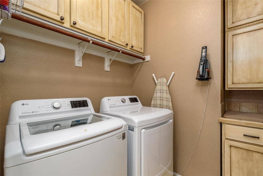 5800 Pine Ridge Boulevard, McKinney, TX 75070 A utility room with plenty of storage.