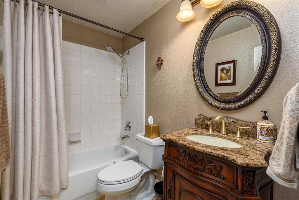 5800 Pine Ridge Boulevard, McKinney, TX 75070 A downstairs full bathroom.