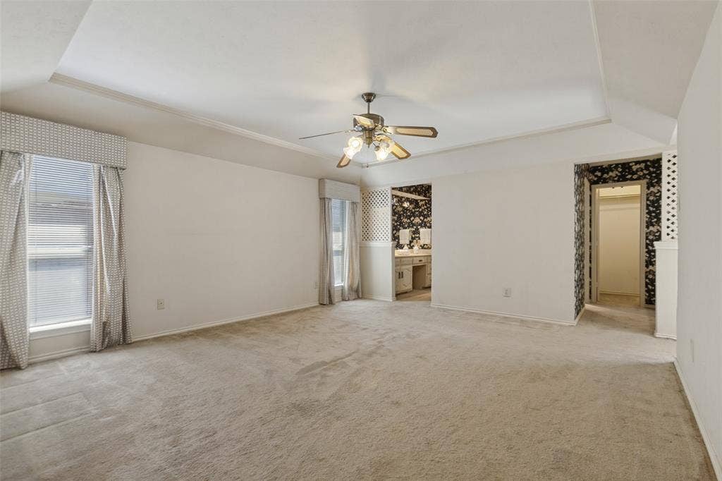 1700 Mayflower Drive, Richardson, TX 75081 Large bedroom with views of separate vanity areas and 2 walk-in closets.