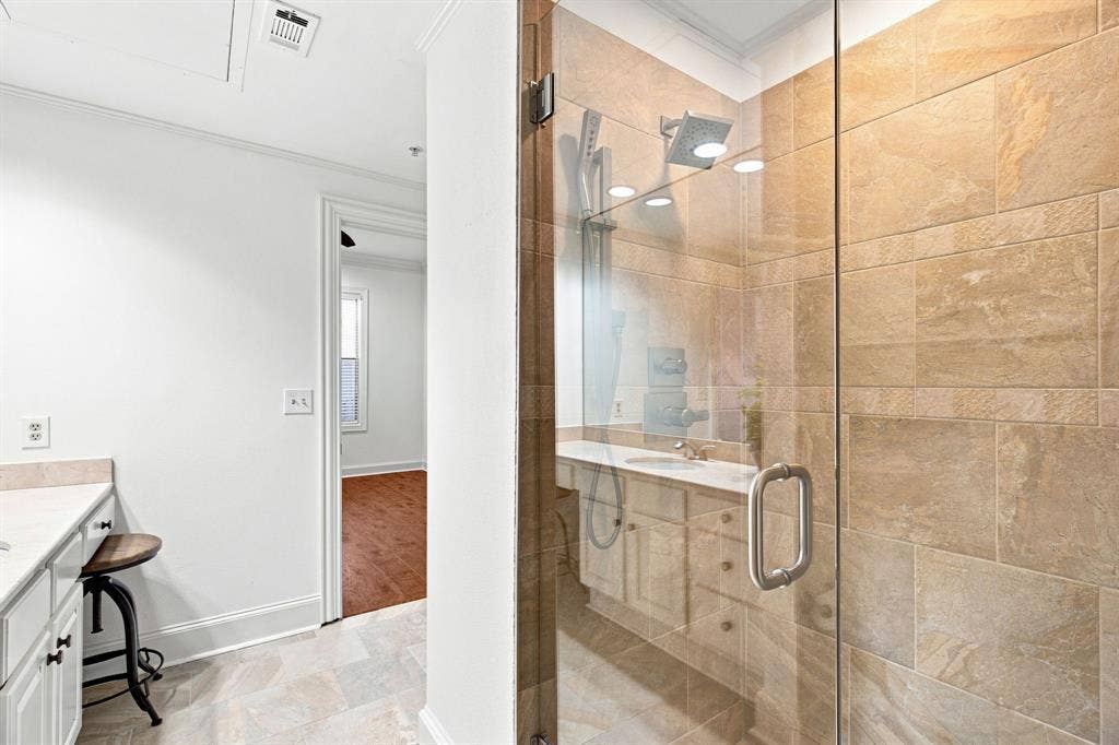 3303 Blackburn Street, #306, Dallas, TX 75204 Walk-in shower with full glass enclosure and tile surround