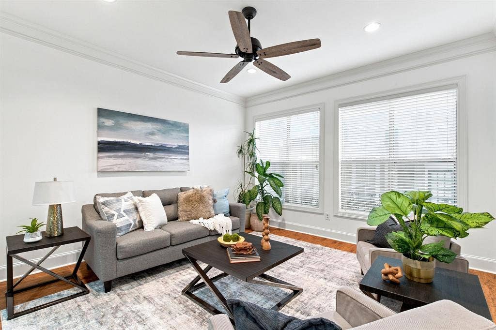 3303 Blackburn Street, #306, Dallas, TX 75204 Recessed lighting, crown molding, wood-finish flooring, multiple windows, and a ceiling fan with integrated lighting