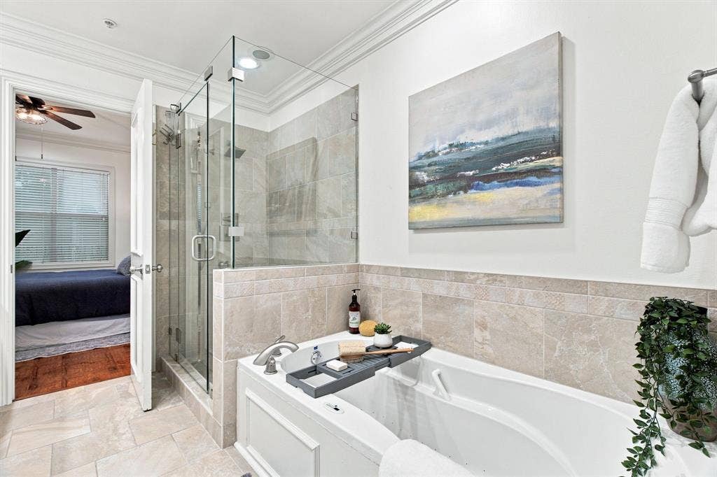 3303 Blackburn Street, #306, Dallas, TX 75204 Primary bathroom with soaking tub and separate large shower.