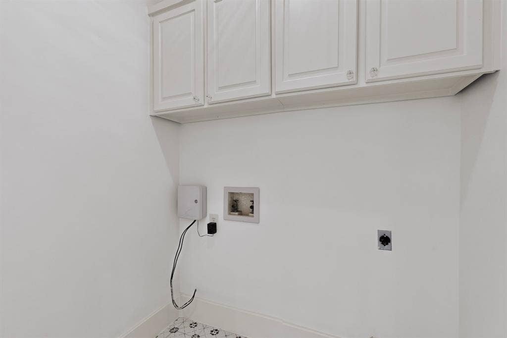 2 Trailridge Drive, Melissa, TX 75454 White cabinetry, patterned floor tiles, light-toned walls