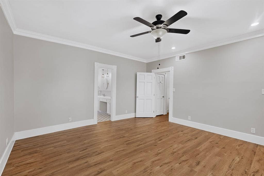 2 Trailridge Drive, Melissa, TX 75454 Wood-finish flooring, crown molding, ceiling fan, recessed lighting, and panel doors