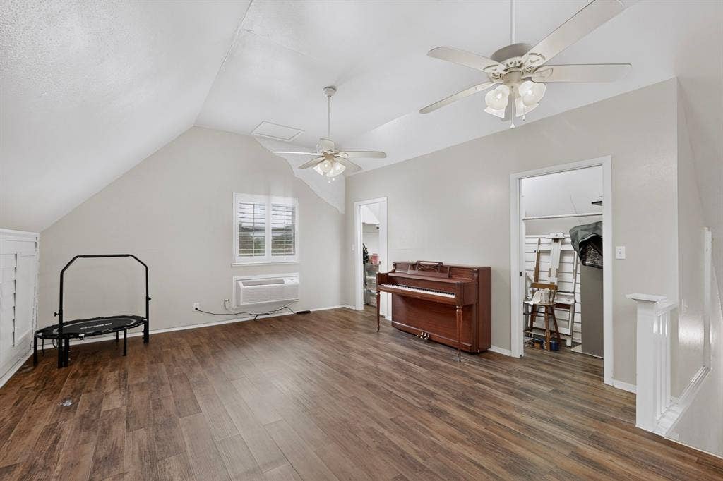 2 Trailridge Drive, Melissa, TX 75454 Wood-finish flooring throughout, complemented by sloped ceilings