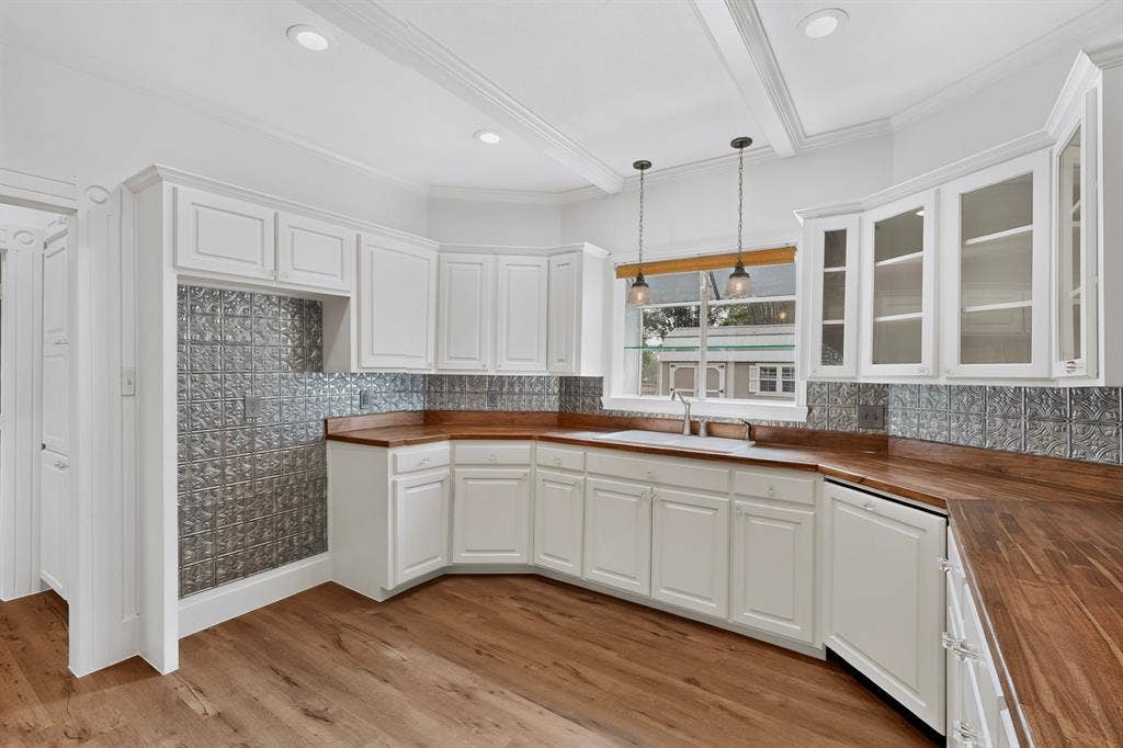 2 Trailridge Drive, Melissa, TX 75454 White cabinetry, pressed tin backsplash, wood-finish flooring, wood countertops, and recessed lighting
