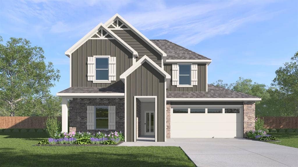 1932 Freeman Street, Tyler, TX 75704 Two-story residence featuring a combination of vertical siding, brick, and stone facade
