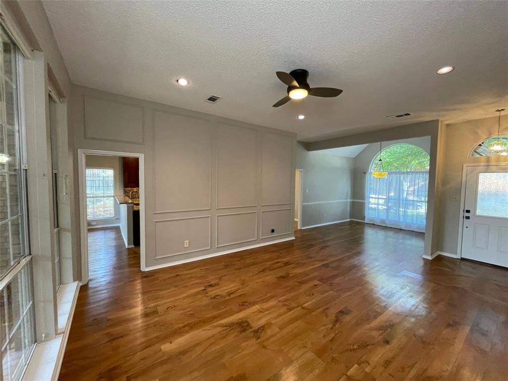 1818 Haydenbend Circle, Grapevine, TX 76051 Living area looing to front door and Dining area