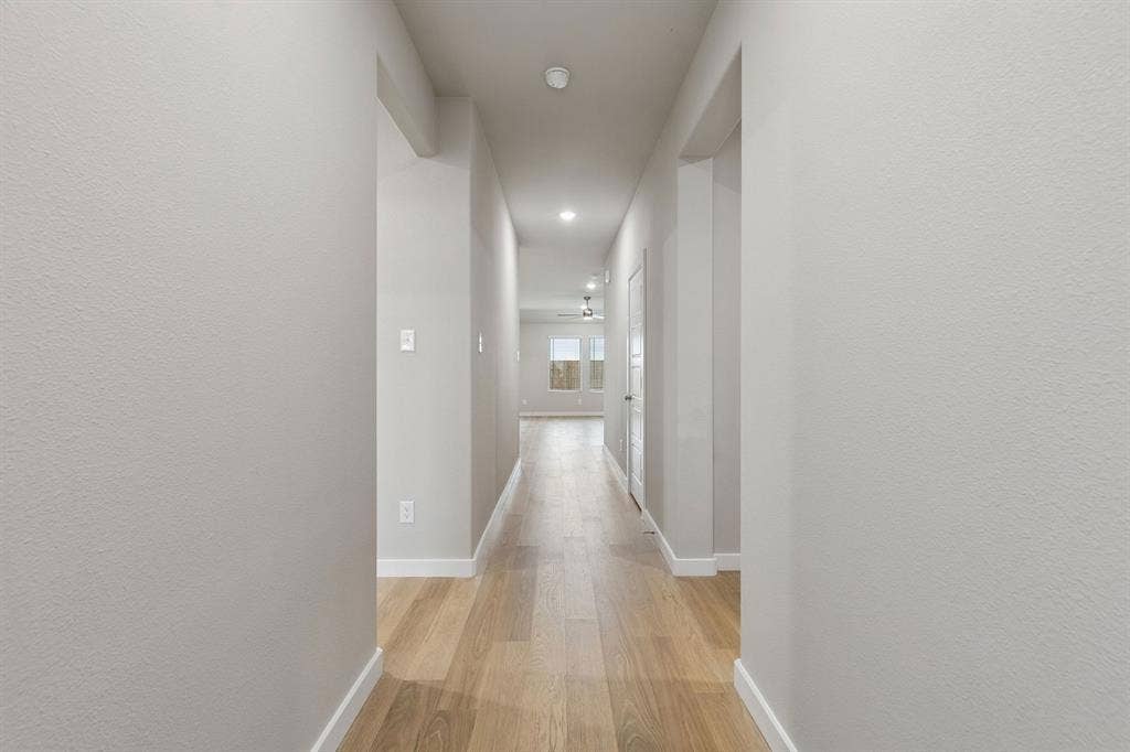 15121 Ram Rock Drive, Aledo, TX 76008 Entryway in the Emmy II home plan by Trophy Signature Homes - REPRESENTATIVE PHOTO