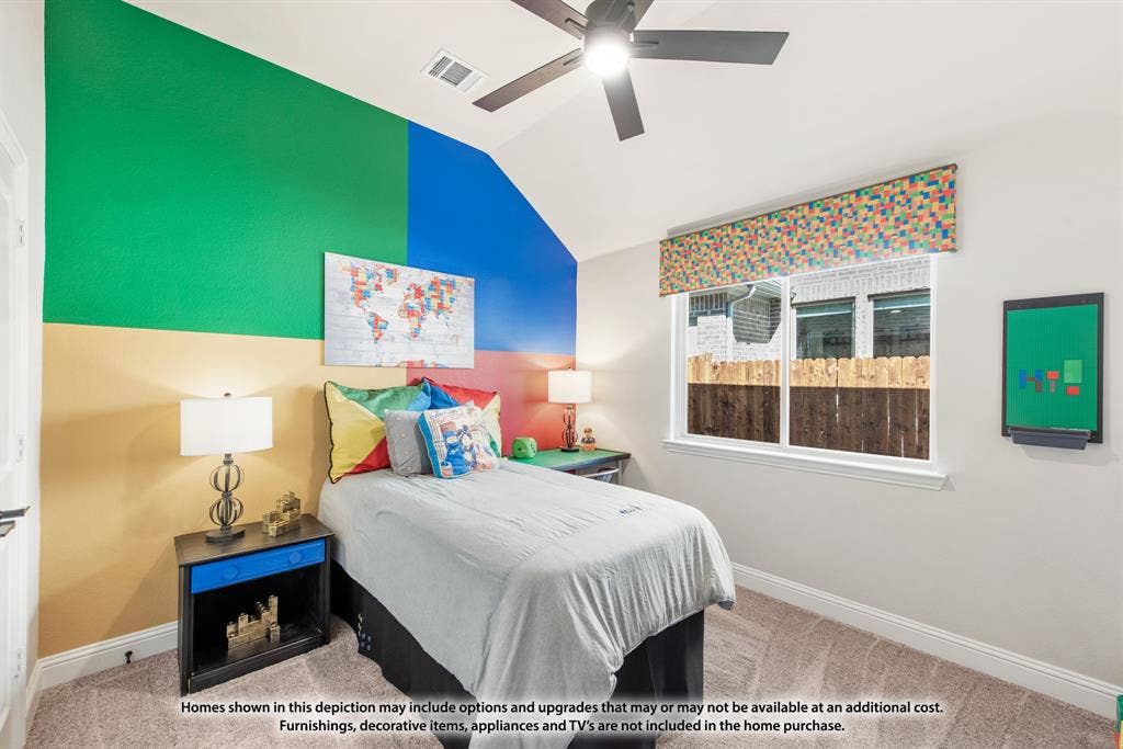 942 Cardinal Drive, Midlothian, TX 76065 Vaulted ceiling with a flush-mount ceiling fan, neutral carpet flooring, and a double-pane window