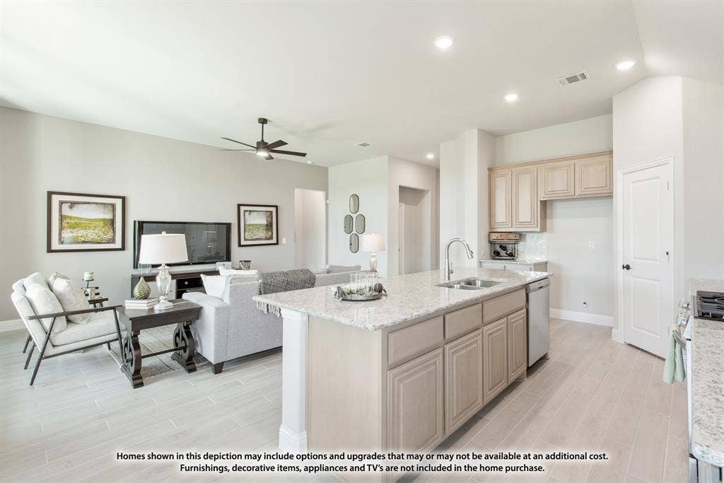 942 Cardinal Drive, Midlothian, TX 76065 Open concept living area with light-toned wood-finish flooring, recessed lighting, and a ceiling fan